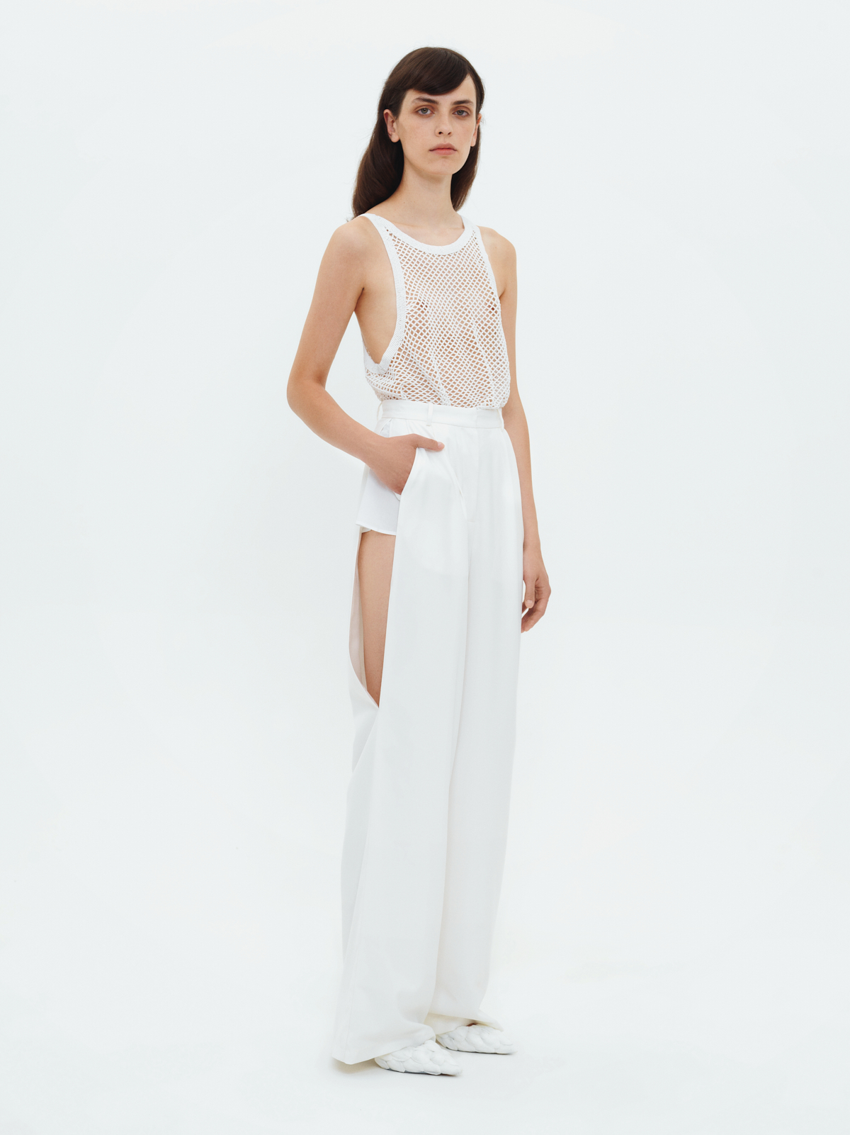 TROUSERS WITH SLITS IN WHITE