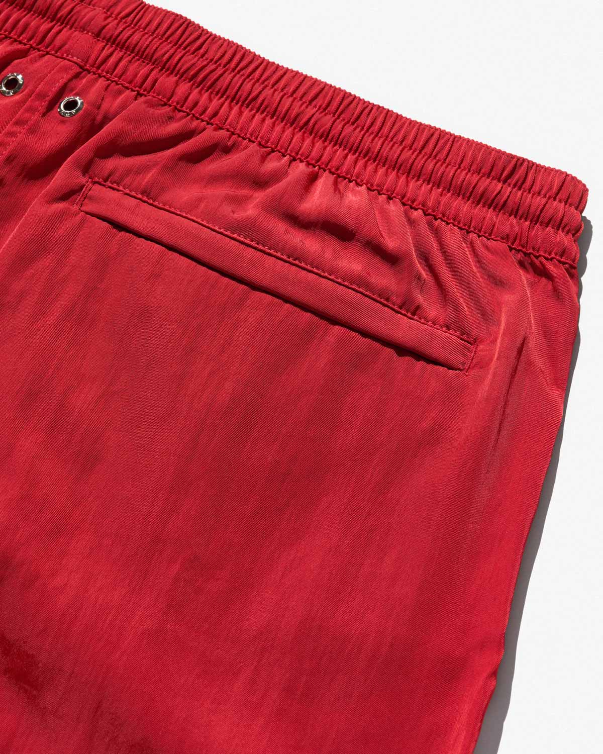 SWIM SHORTS IN POPPY RED SATIN TWILL