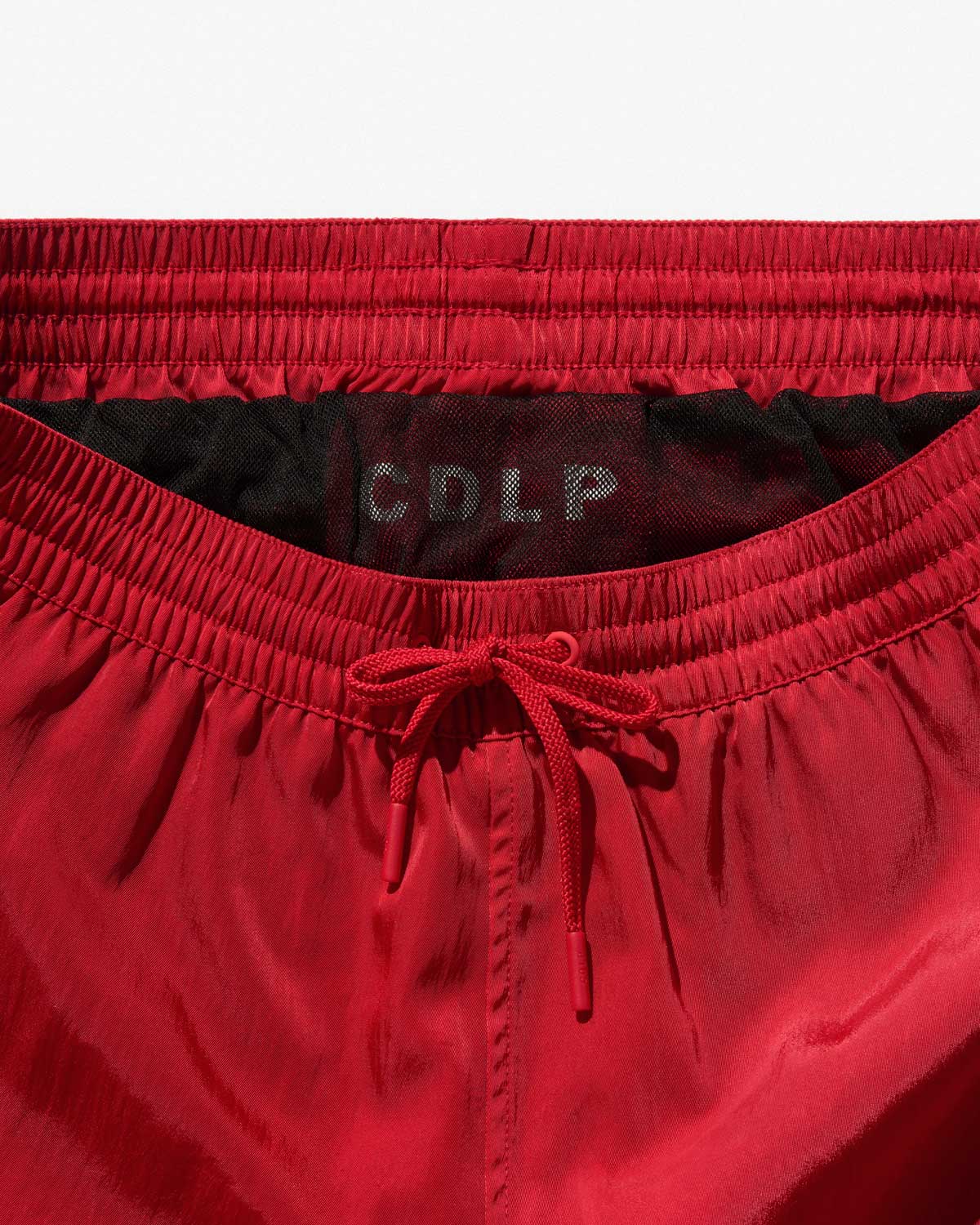 SWIM SHORTS IN POPPY RED SATIN TWILL