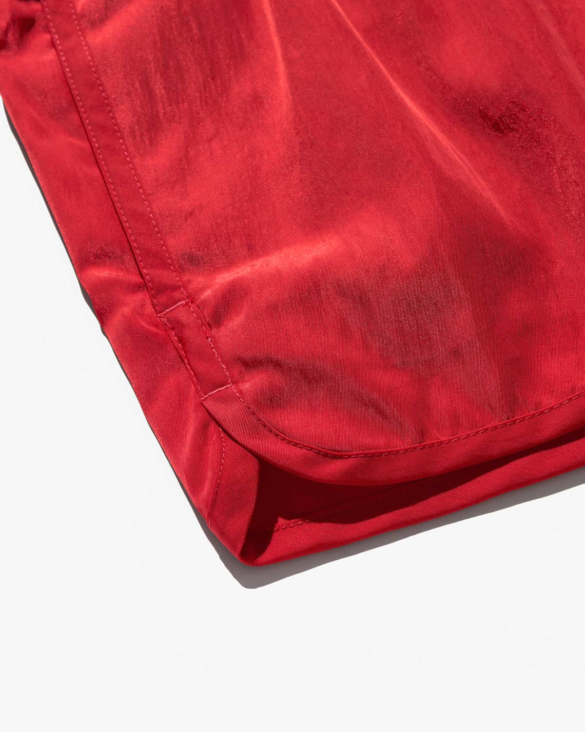 SWIM SHORTS IN POPPY RED SATIN TWILL