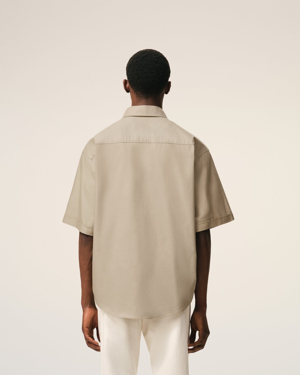 QUOTA -BOXY SHORT SLEEVE SHIRT WITH BUTTON DOWN COLLAR AND EMBROIDERED ADC IN BEIGE TAUPE