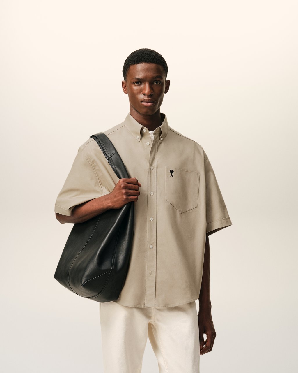 QUOTA -BOXY SHORT SLEEVE SHIRT WITH BUTTON DOWN COLLAR AND EMBROIDERED ADC IN BEIGE TAUPE