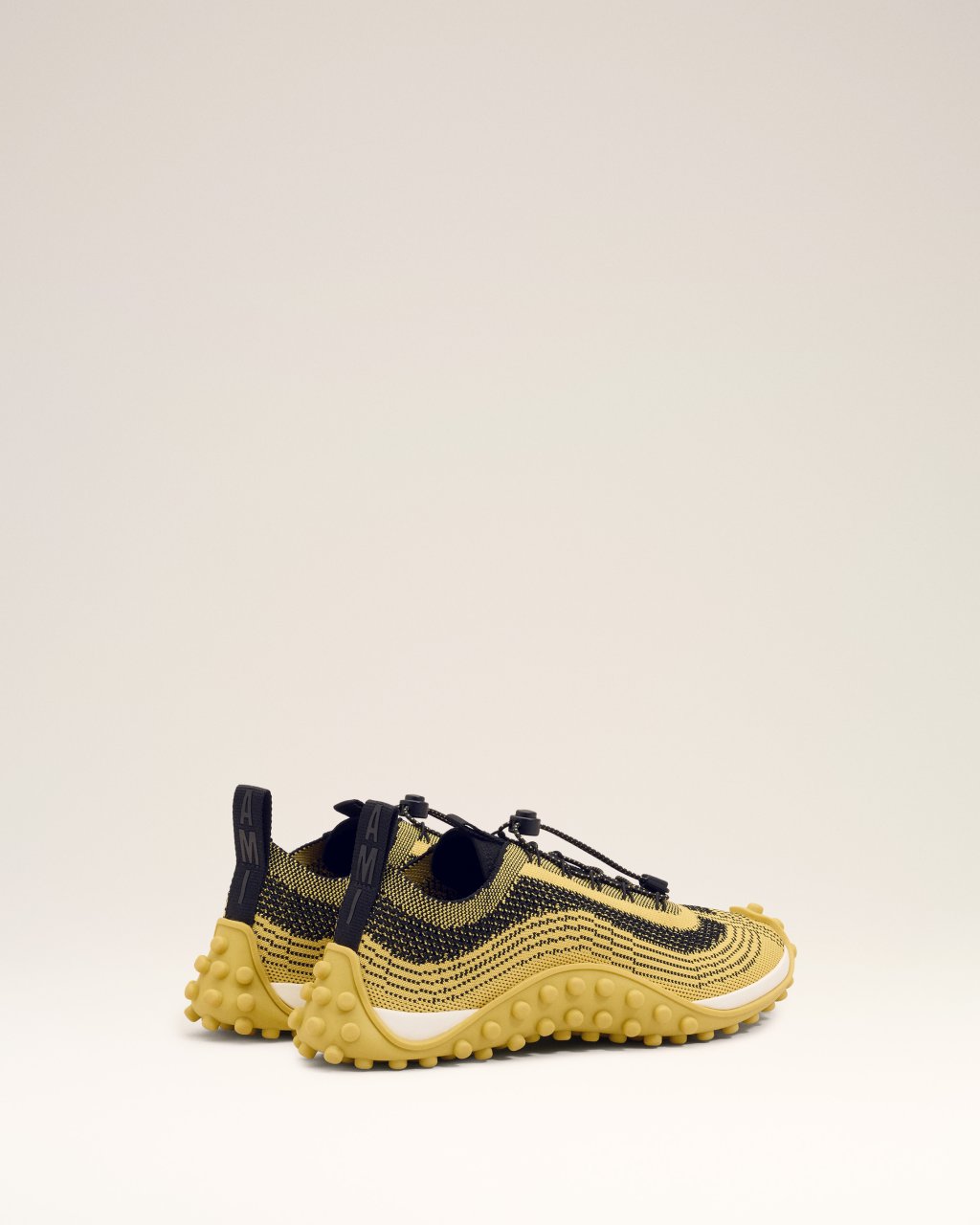 MIRAGE SNEAKERS IN JAUNE PASTEL/NOIR