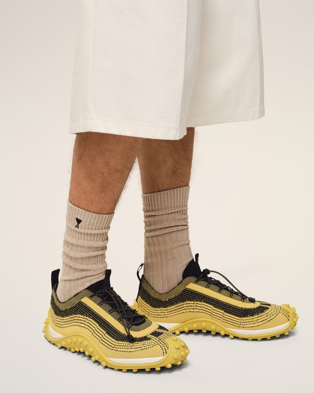 MIRAGE SNEAKERS IN JAUNE PASTEL/NOIR