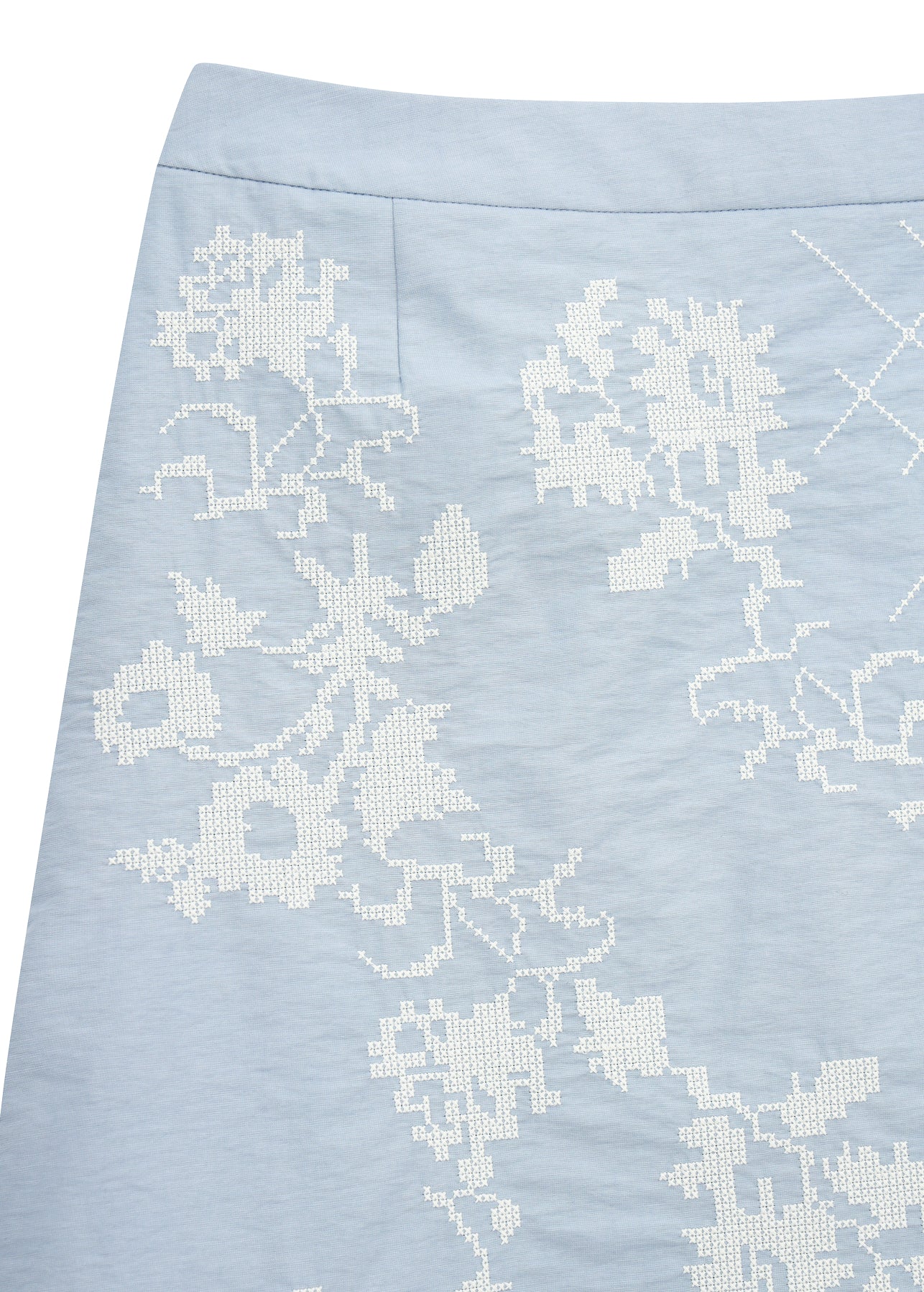 MINI SKIRT WITH TYN EMBROIDERY IN BLUE