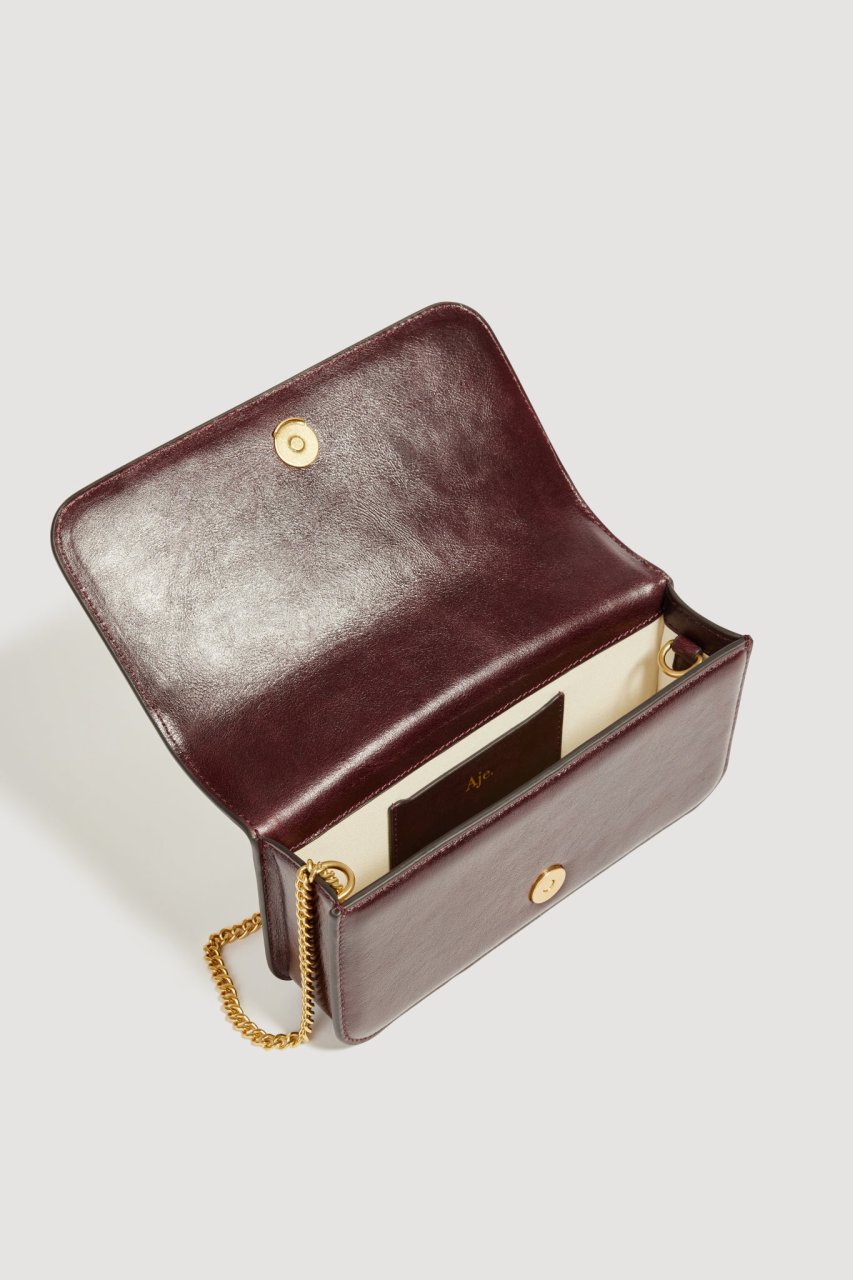 CELESTE FLOWER CLUTCH MERLOT