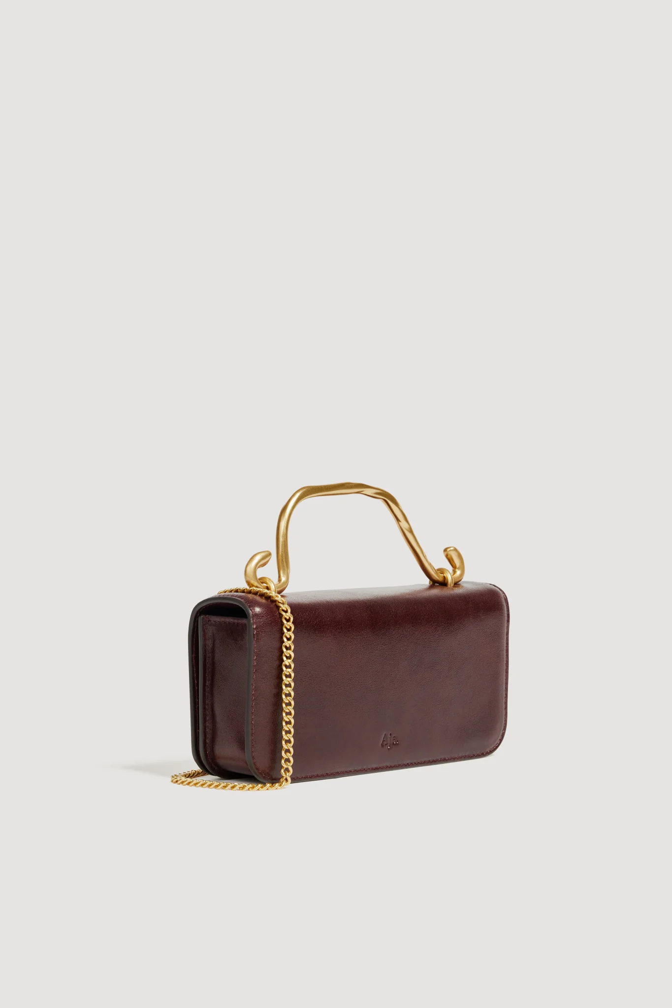 CELESTE FLOWER CLUTCH MERLOT