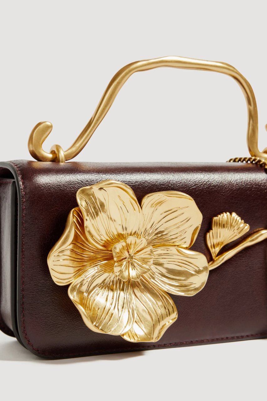 CELESTE FLOWER CLUTCH MERLOT
