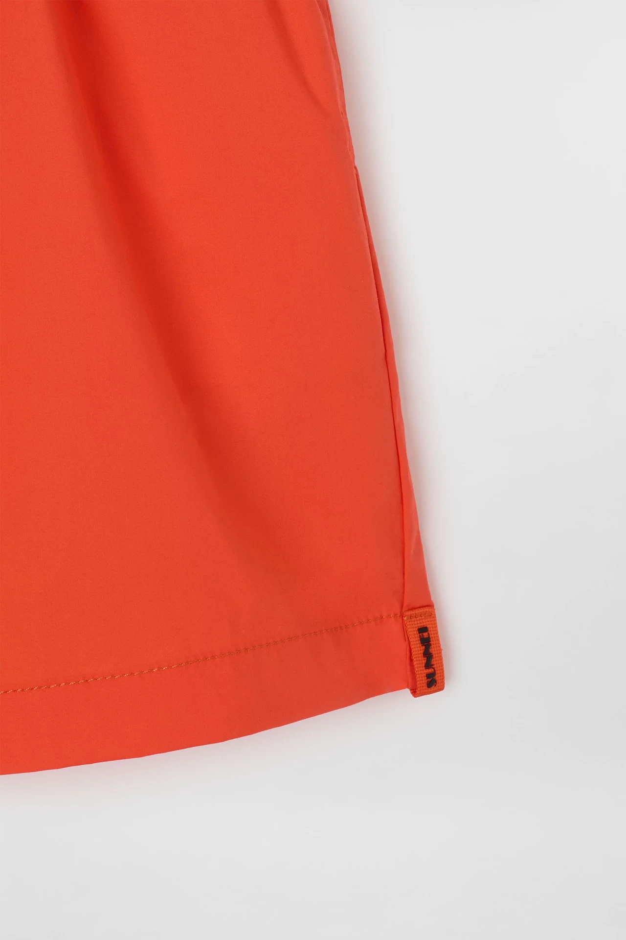 ELASTIC SHORTS IN BRIGHT ORANGE