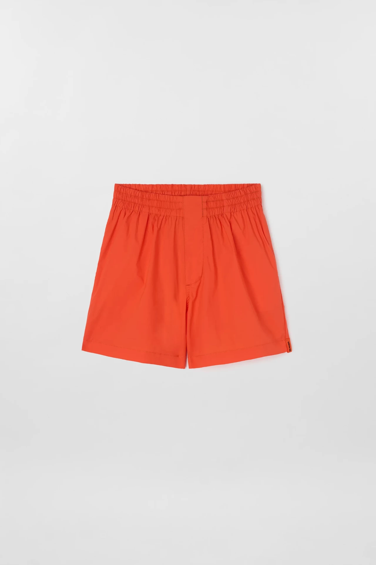 ELASTIC SHORTS IN BRIGHT ORANGE