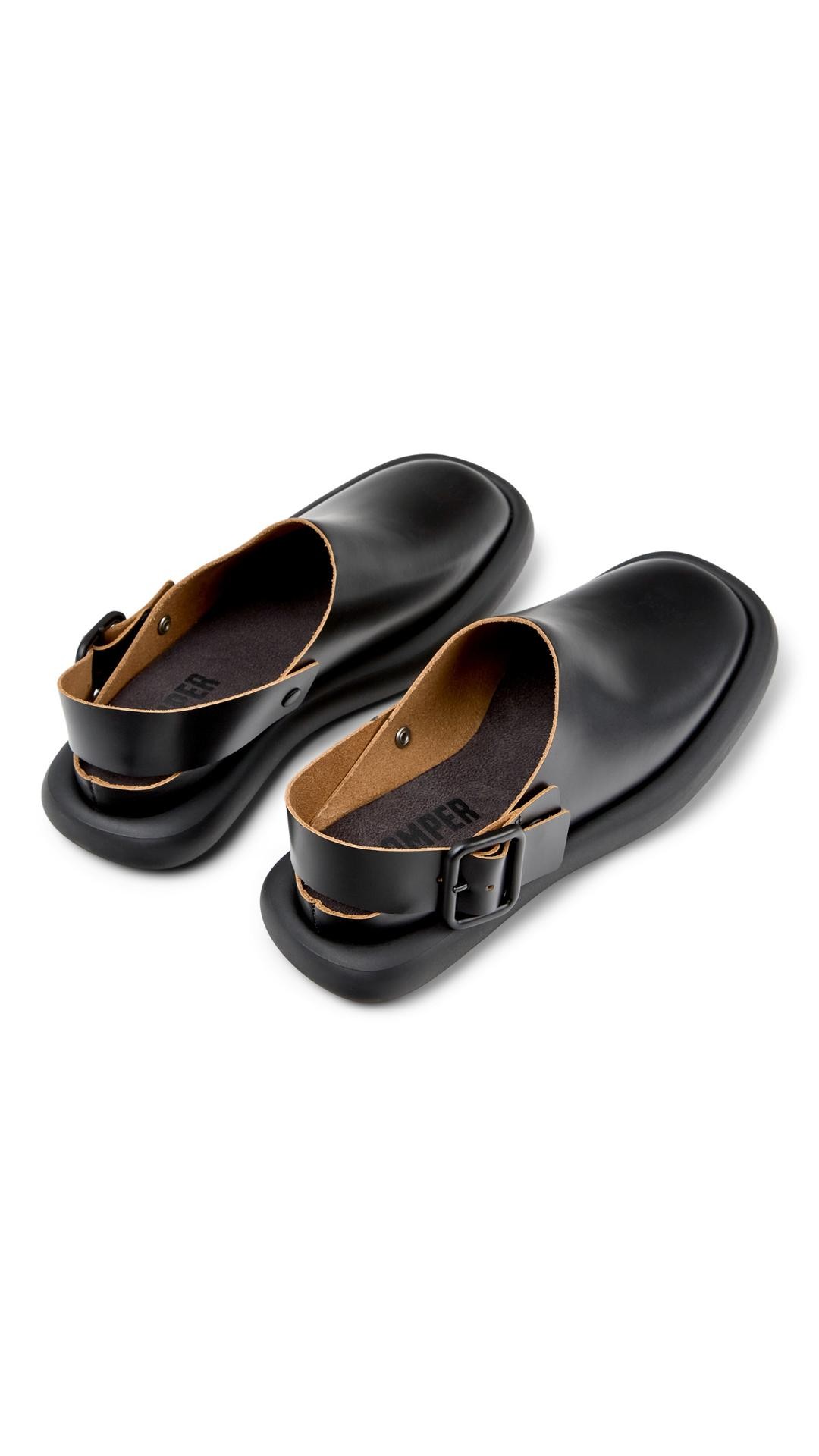 WOMEN'S ONDA LEATHER MULES IN BLACK