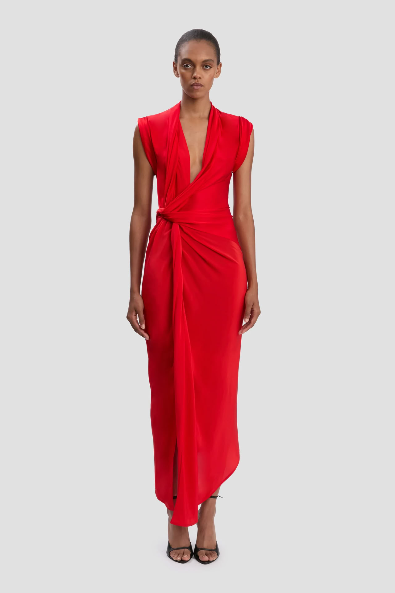 ASYMMETRIC TWIST DETAIL DRESS IN CARDINAL RED