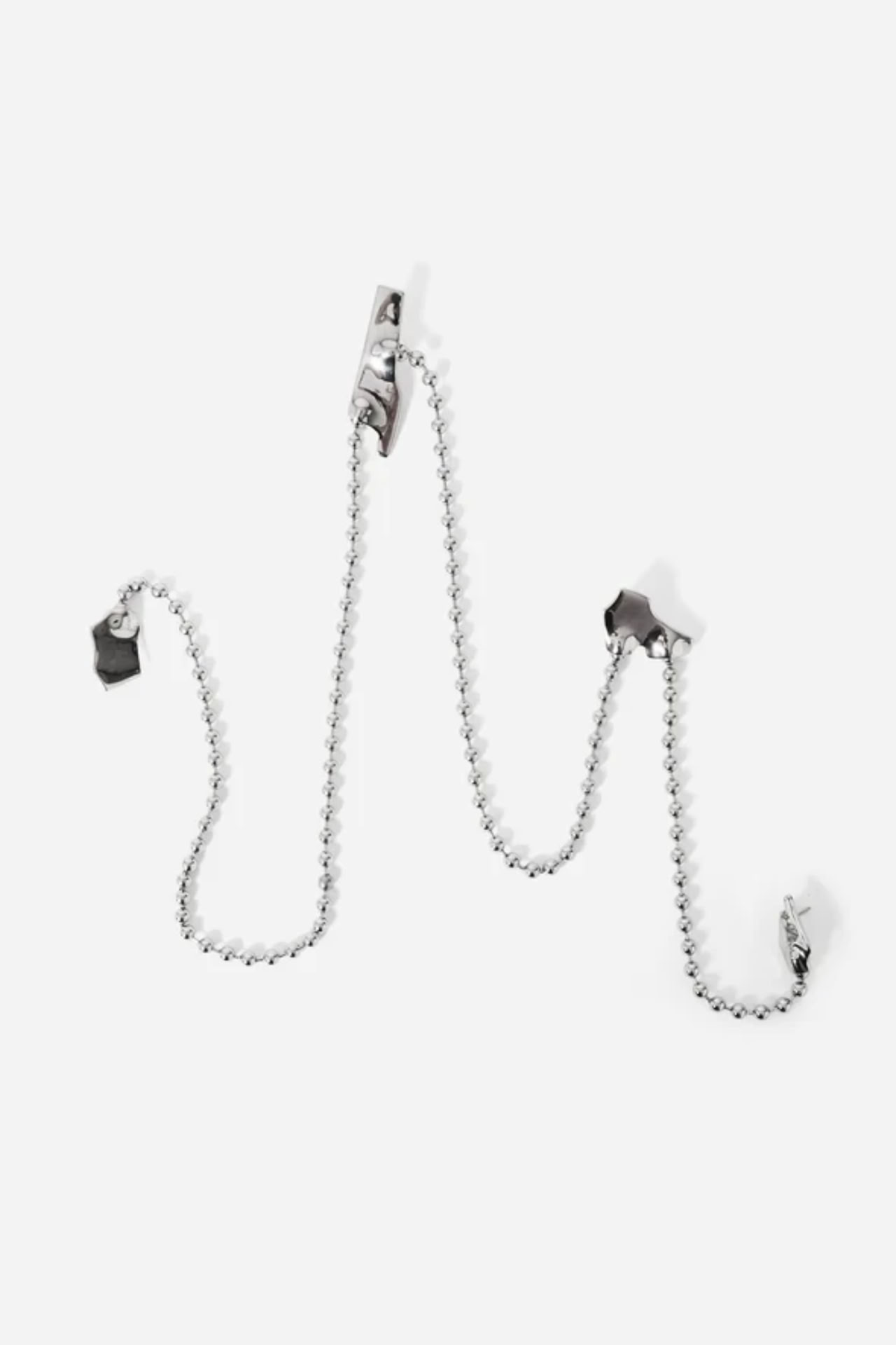 BROOCH MADE OF STAINLESS STEEL WITH FOUR ELEMENTS