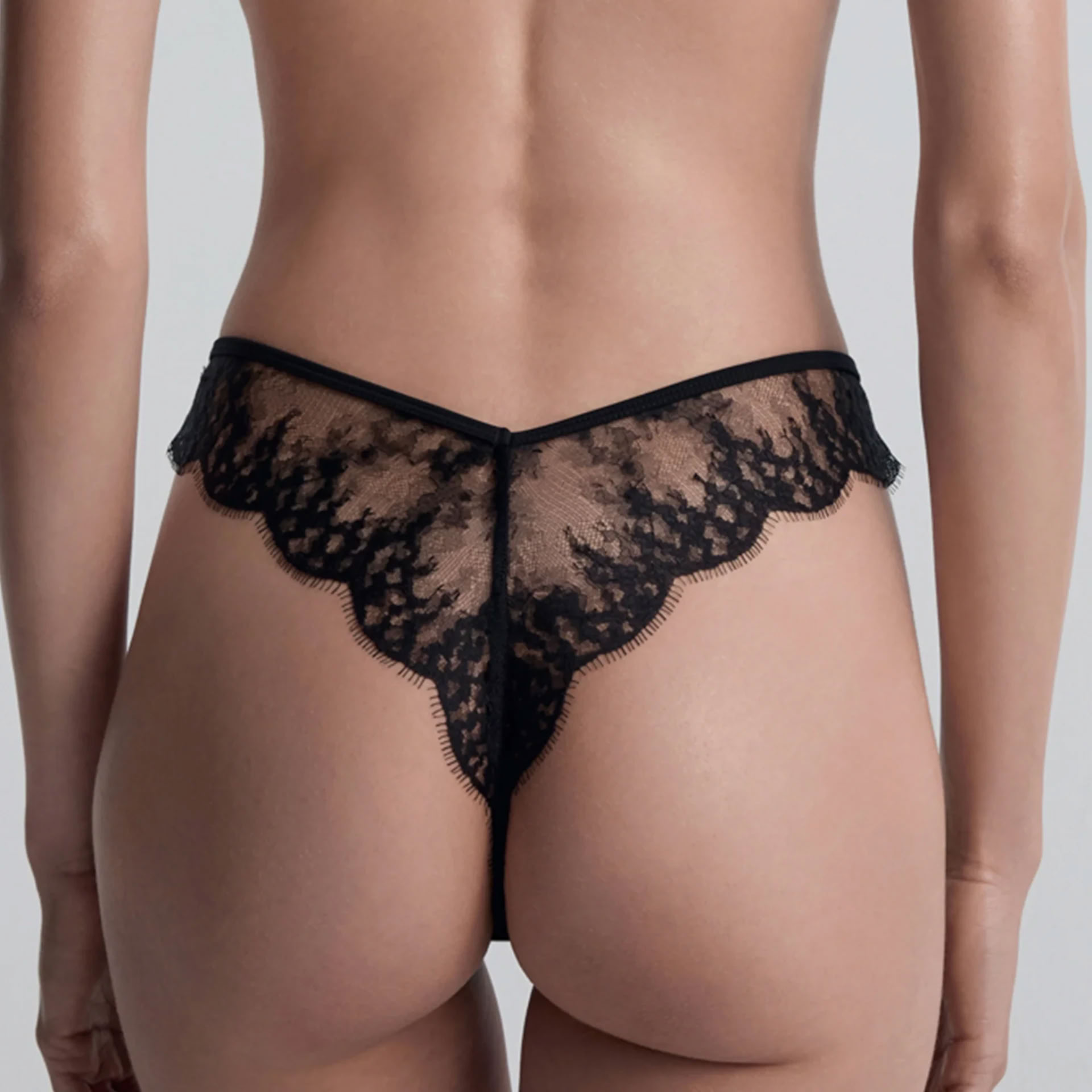 LEAVERS EYELASH LACE LOW-RISE THONG IN BLACK