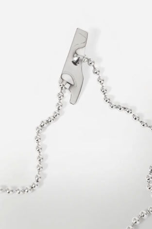 BROOCH MADE OF STAINLESS STEEL WITH FOUR ELEMENTS