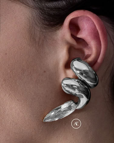 BLOWN SHARP ALIEN EAR SET IN SILVER