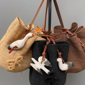 BAG CHARM: FLYING SEABIRD IN WHITE/GREY/BROWN