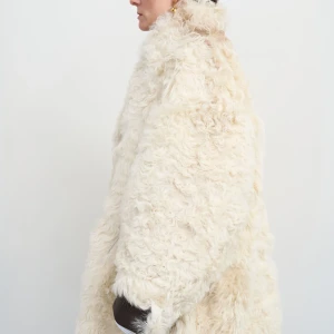 REVERSIBLE SHEARLING COAT