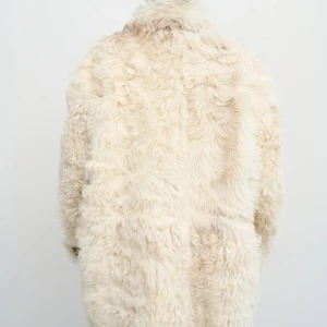 REVERSIBLE SHEARLING COAT