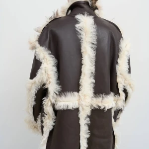 REVERSIBLE SHEARLING COAT
